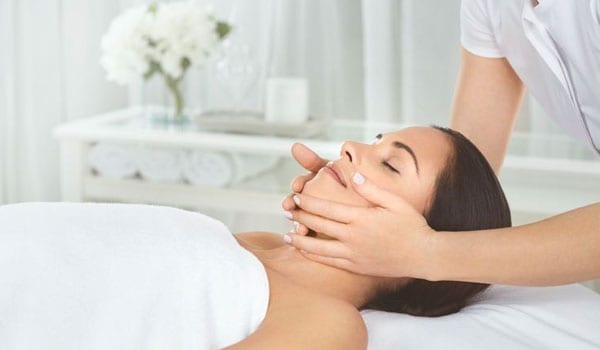 A woman getting massaged